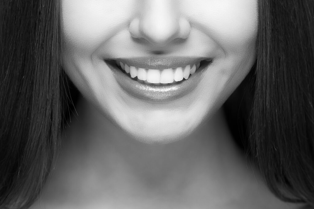 Woman Smile. Teeth Whitening. Dental Care.
